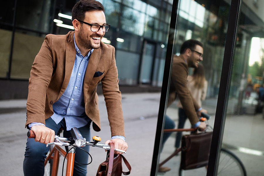 Happy,Young,Stylish,Businessman,Going,To,Work,By,Bike